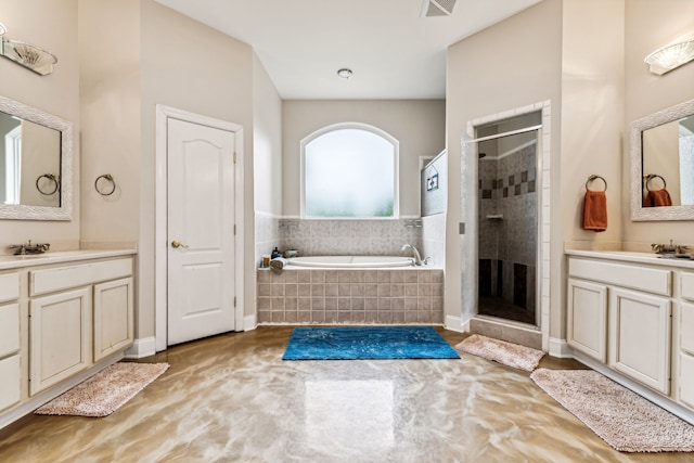 bathroom with plus walk in shower and vanity