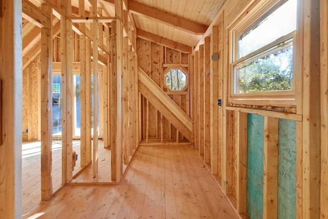 misc room with hardwood / wood-style floors, wooden ceiling, and lofted ceiling