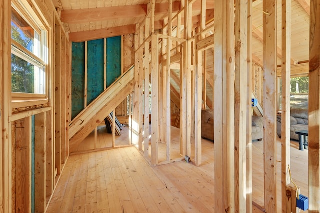 miscellaneous room featuring beamed ceiling, hardwood / wood-style flooring, and wooden ceiling