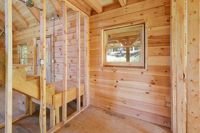 interior space featuring wood walls