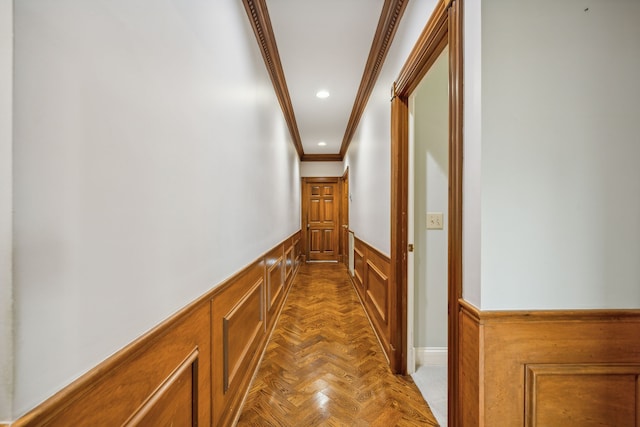 corridor featuring light parquet flooring and ornamental molding