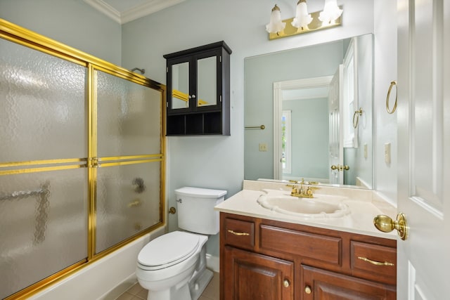 full bathroom featuring vanity, tile patterned floors, bath / shower combo with glass door, crown molding, and toilet