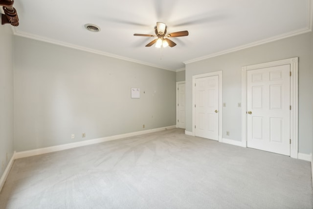 unfurnished bedroom with carpet floors, ceiling fan, and ornamental molding