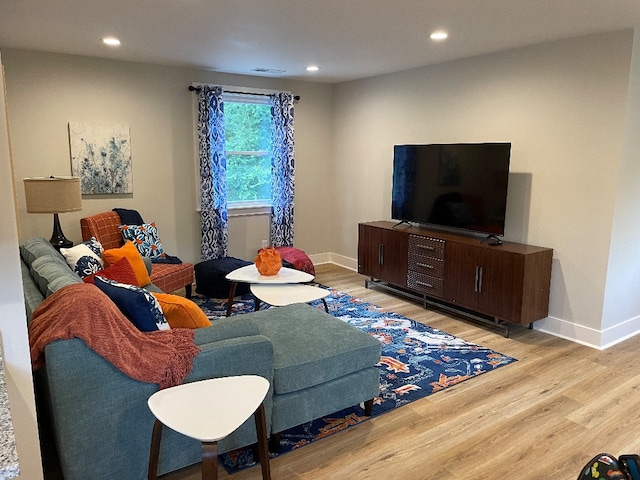 living room featuring light wood-type flooring