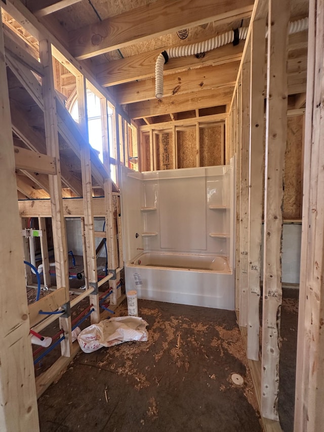 bathroom featuring a bath