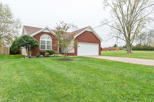 single story home featuring a garage and a front lawn