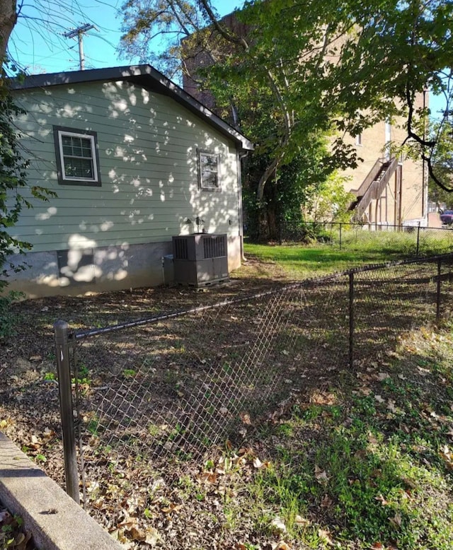 view of home's exterior featuring central AC unit