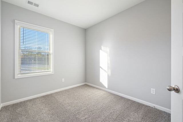 view of carpeted spare room