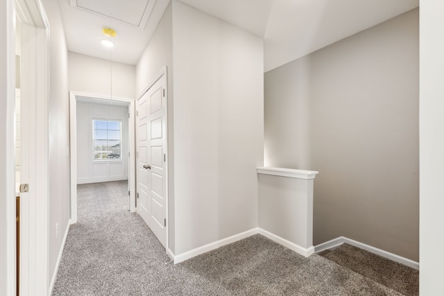 corridor with carpet flooring