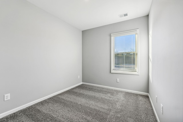 empty room featuring carpet floors