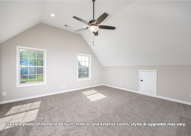 additional living space with ceiling fan, carpet floors, a healthy amount of sunlight, and lofted ceiling