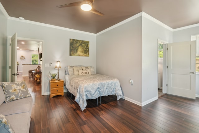 bedroom with ceiling fan, crown molding, and dark hardwood / wood-style flooring