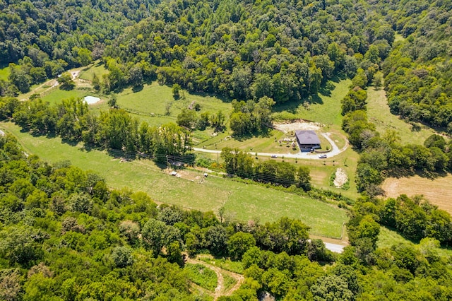 birds eye view of property featuring a rural view