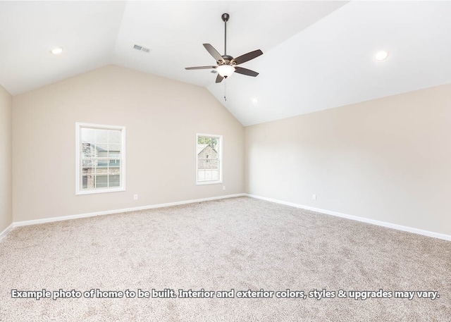 spare room featuring a ceiling fan, visible vents, vaulted ceiling, and baseboards