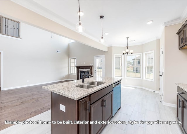 kitchen featuring a sink, open floor plan, dark brown cabinets, ornamental molding, and stainless steel dishwasher