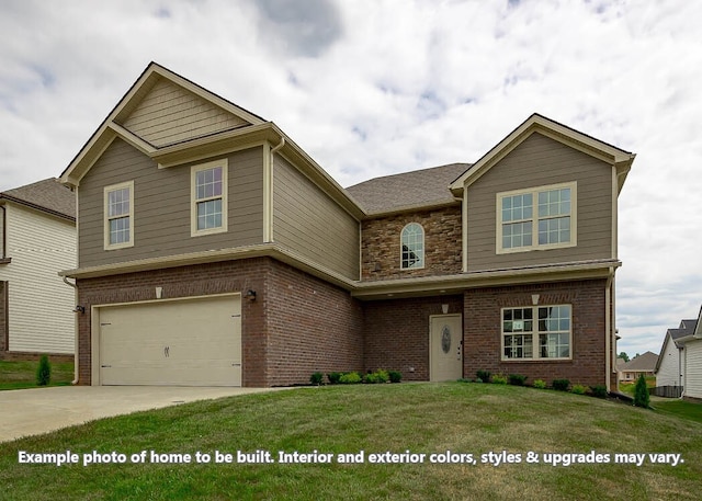 view of front of property featuring a front yard and a garage