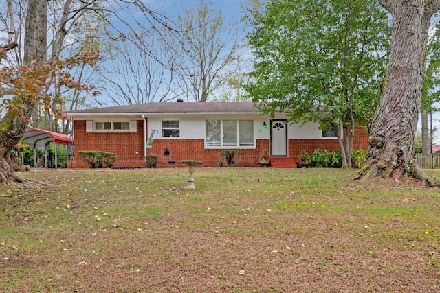 single story home featuring a front yard and a carport