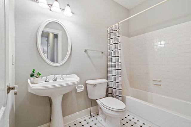 bathroom featuring tile patterned flooring, toilet, and shower / bathtub combination with curtain