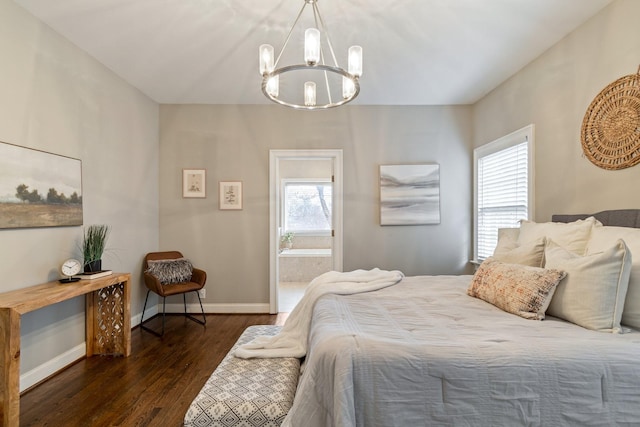 bedroom featuring multiple windows, dark hardwood / wood-style flooring, and an inviting chandelier