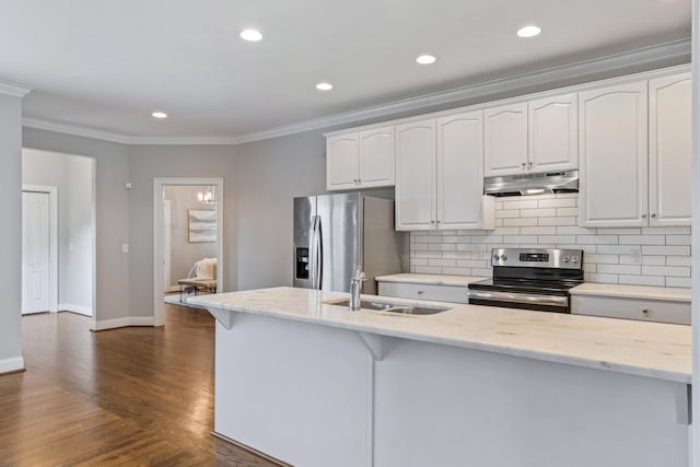 kitchen featuring appliances with stainless steel finishes, dark hardwood / wood-style flooring, white cabinetry, and sink