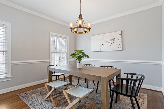 dining space with dark hardwood / wood-style flooring and a wealth of natural light