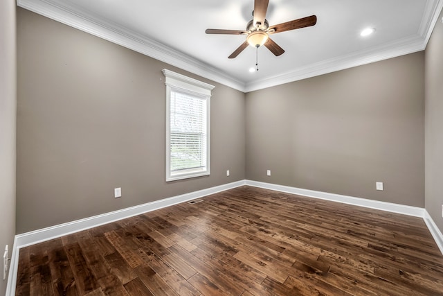 spare room with dark hardwood / wood-style floors, ceiling fan, and ornamental molding