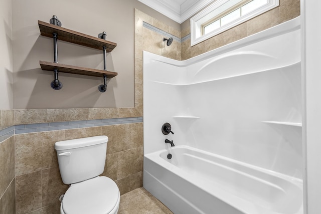 bathroom with toilet, shower / tub combination, and crown molding