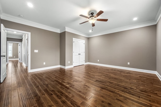 unfurnished bedroom with ceiling fan, dark hardwood / wood-style flooring, ornamental molding, and a closet