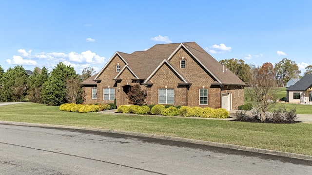 view of front of home with a front yard