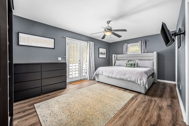 bedroom with access to outside, ceiling fan, and dark wood-type flooring