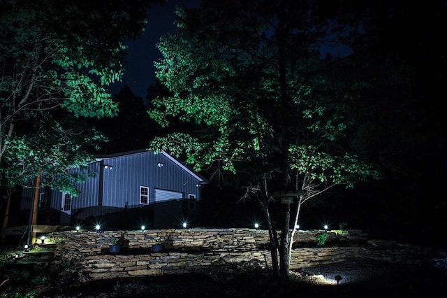 view of yard at twilight