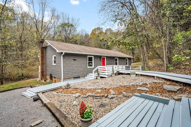 view of front of property featuring a deck