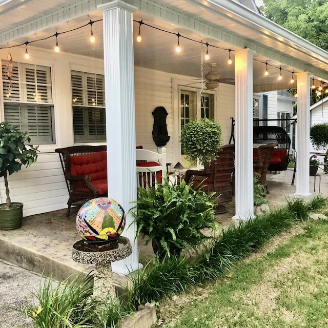 view of patio / terrace featuring ceiling fan