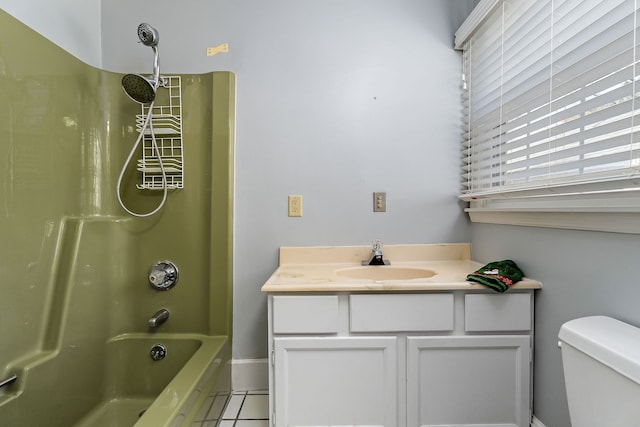 full bathroom featuring tile patterned flooring, vanity, toilet, and shower / washtub combination