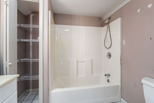 full bathroom with tile patterned floors, vanity, toilet, and tub / shower combination