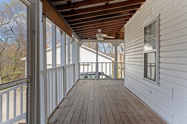 wooden deck with ceiling fan