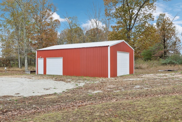 view of outbuilding featuring a garage