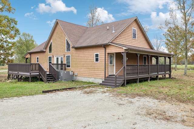 back of house featuring central AC