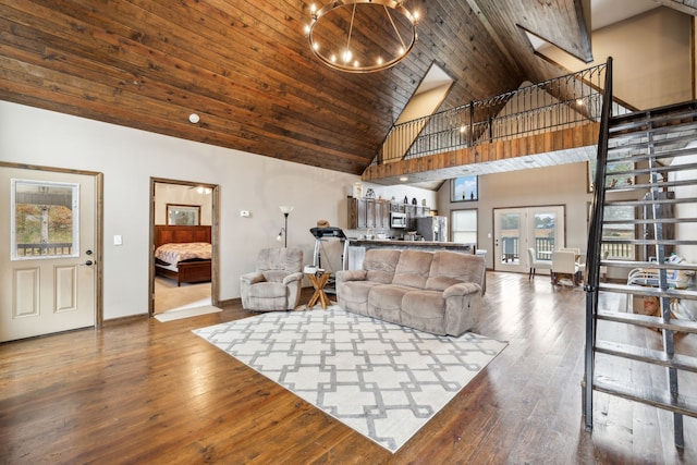 living room featuring french doors, wooden ceiling, high vaulted ceiling, a notable chandelier, and hardwood / wood-style floors