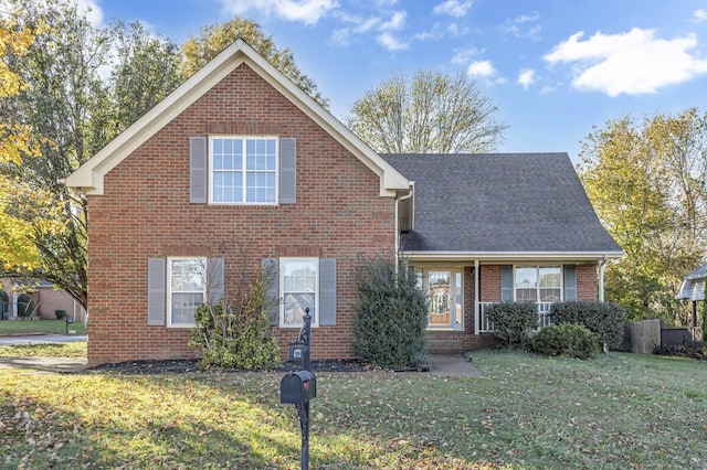 front facade with a front yard