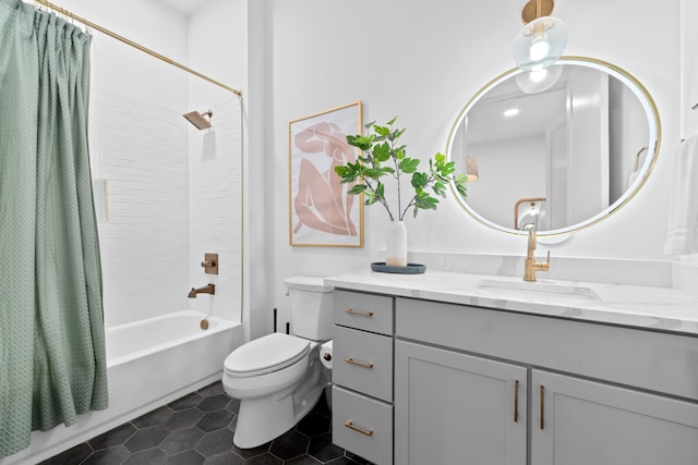 full bathroom featuring toilet, shower / bath combination with curtain, vanity, and tile patterned floors