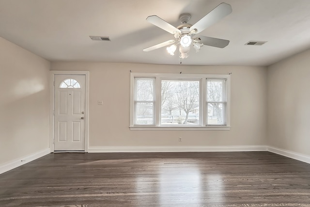 foyer entrance featuring ceiling fan and dark wood-type flooring