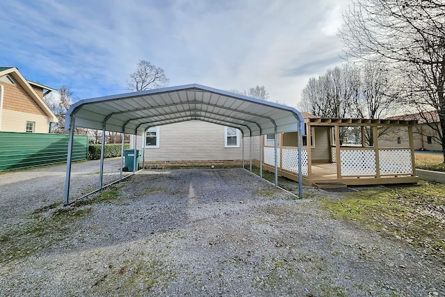 view of vehicle parking with a carport