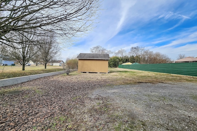 exterior space featuring a storage unit