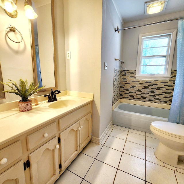 full bathroom featuring tile patterned floors, vanity, shower / bath combination with curtain, and toilet