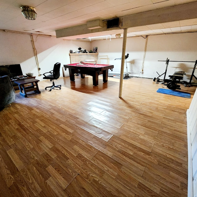 game room featuring wood-type flooring and pool table