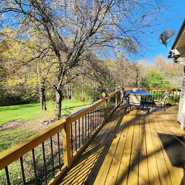 deck featuring a yard