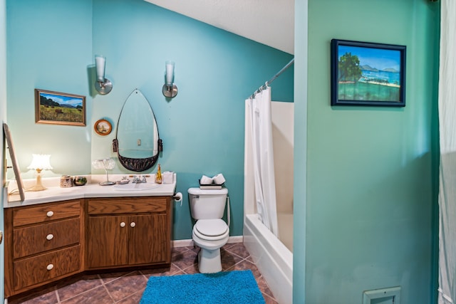 full bathroom featuring tile patterned floors, shower / bath combo with shower curtain, vanity, and toilet