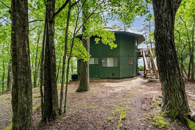 exterior space featuring a deck and central AC unit