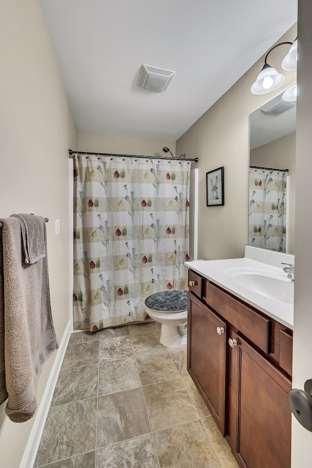 full bathroom featuring vanity, toilet, and shower / tub combo with curtain